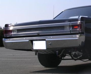 Show details for 1967 Plymouth GTX / Satellite Tail Lamp Trim Bezels With Argent Silver Inners Picture of 1967 Plymouth GTX / Satellite Tail Lamp Trim Bezels With Argent Silver Inners