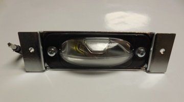 Show details for 1968-1974 Dodge, Plymouth A, B, E-Body License Plate Light Lens Assembly Picture of 1968-1974 Dodge, Plymouth A, B, E-Body License Plate Light Lens Assembly