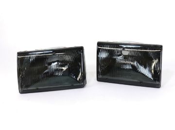 Show details for 1987-1993 Ford Mustang HEADLIGHT ASSEMBLY PAIR SMOKED 87/9 Picture of 1987-1993 Ford Mustang HEADLIGHT ASSEMBLY PAIR SMOKED 87/9