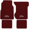 Illustration of 1974-1978 Ford LTD Cutpile floor mats, 4 piece, in 825 Maroon with the #148 Ford logo