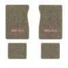 1987 GMC R1500 Suburban floor mats with the GMC logo in Essex 1035A Beige carpet, illustration